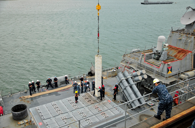 An empty missile canister removed from a Mark 41 vertical launch system silo on the USS Benfold, 2016. That’s a field of 32 VLS silos, the same number as the FFG(X) would carry. And yes, that’s a lot of rust.